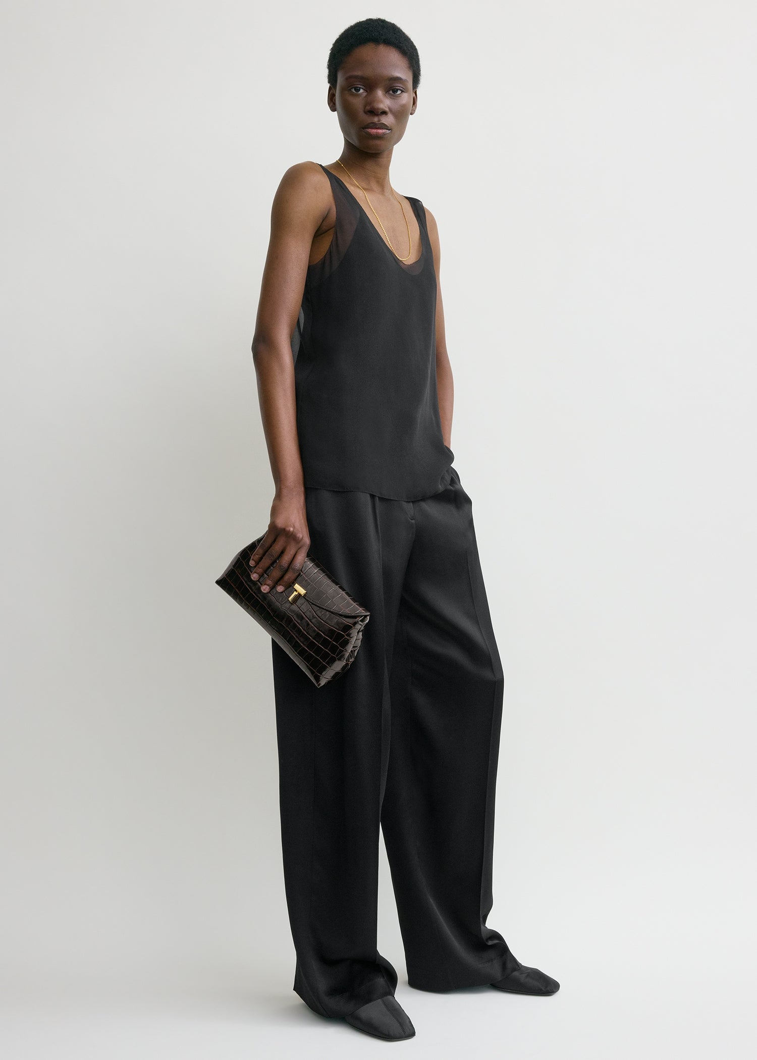 T-lock croco-embossed clutch dark brown