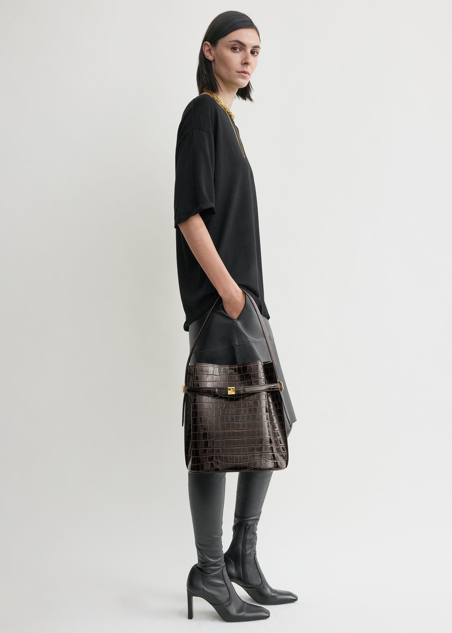Belted croco-embossed bucket bag dark brown