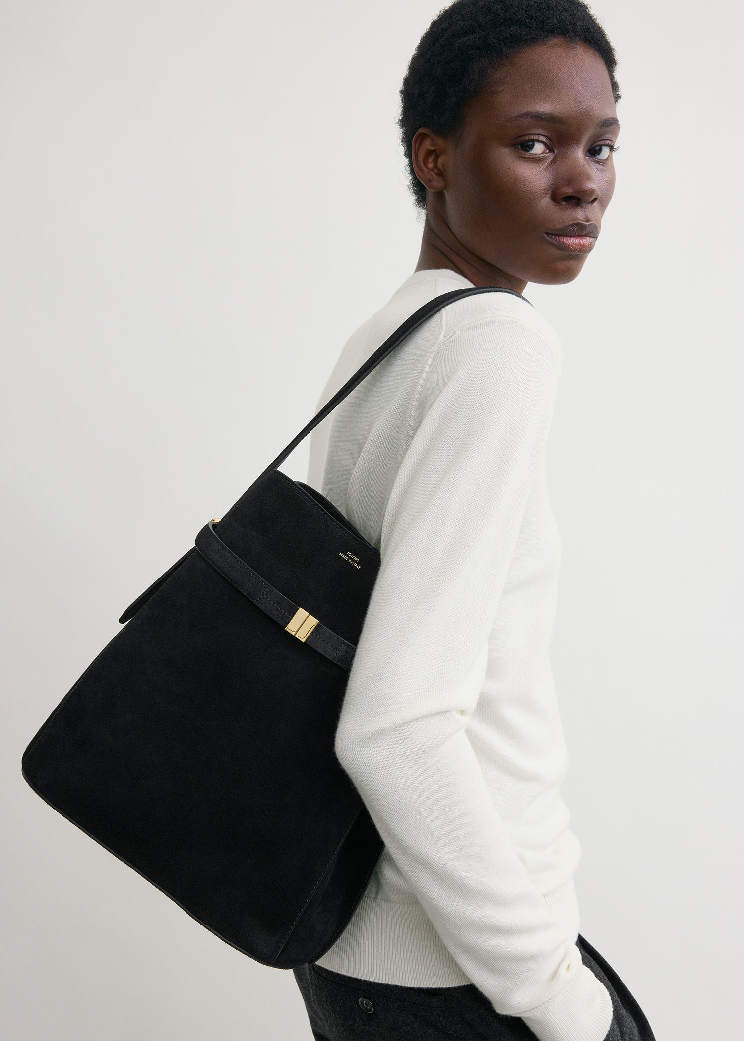Belted suede bucket bag black