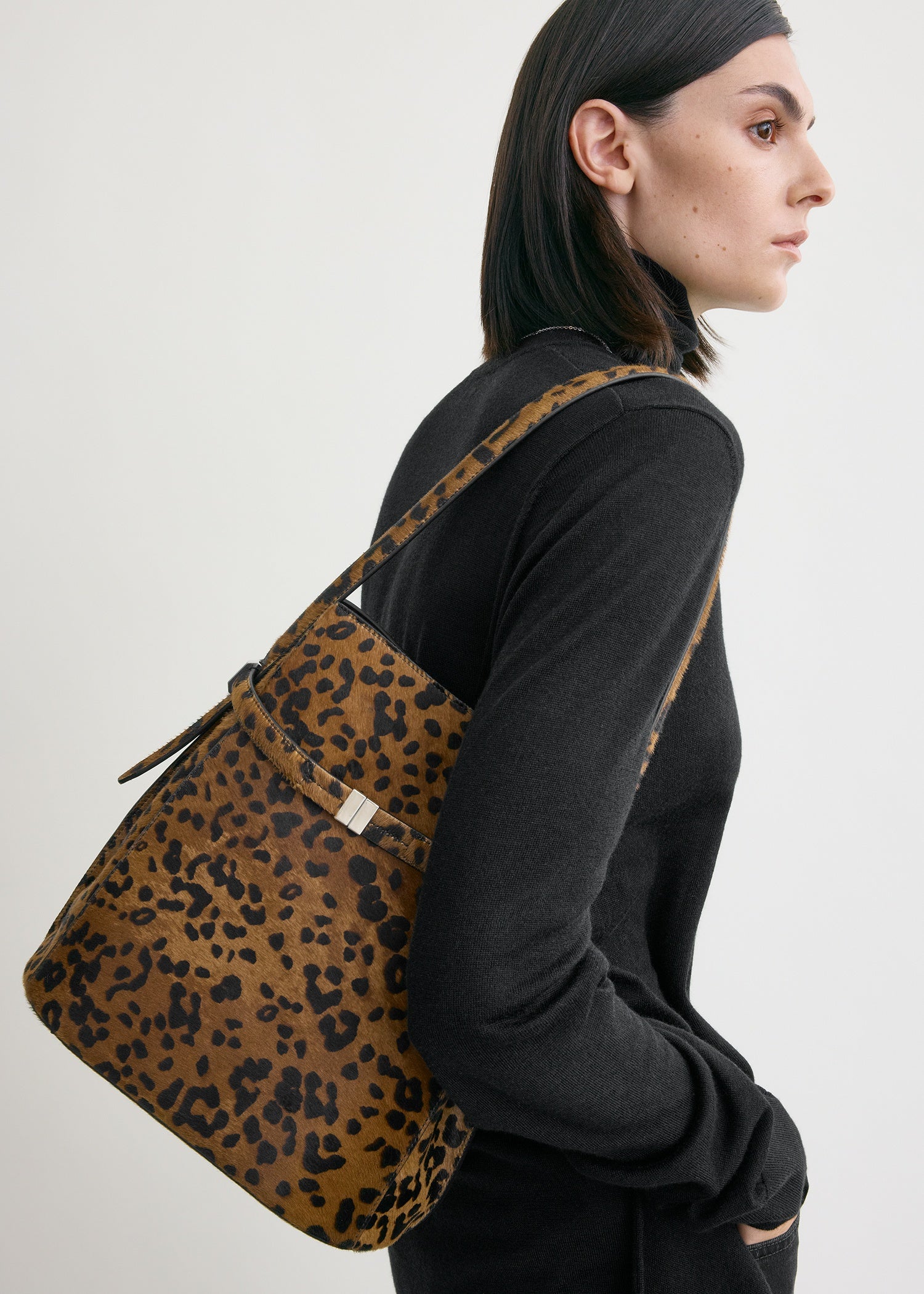 Belted pony hair bucket bag leopard