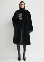 Collarless shearling coat black
