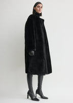 Collarless shearling coat black