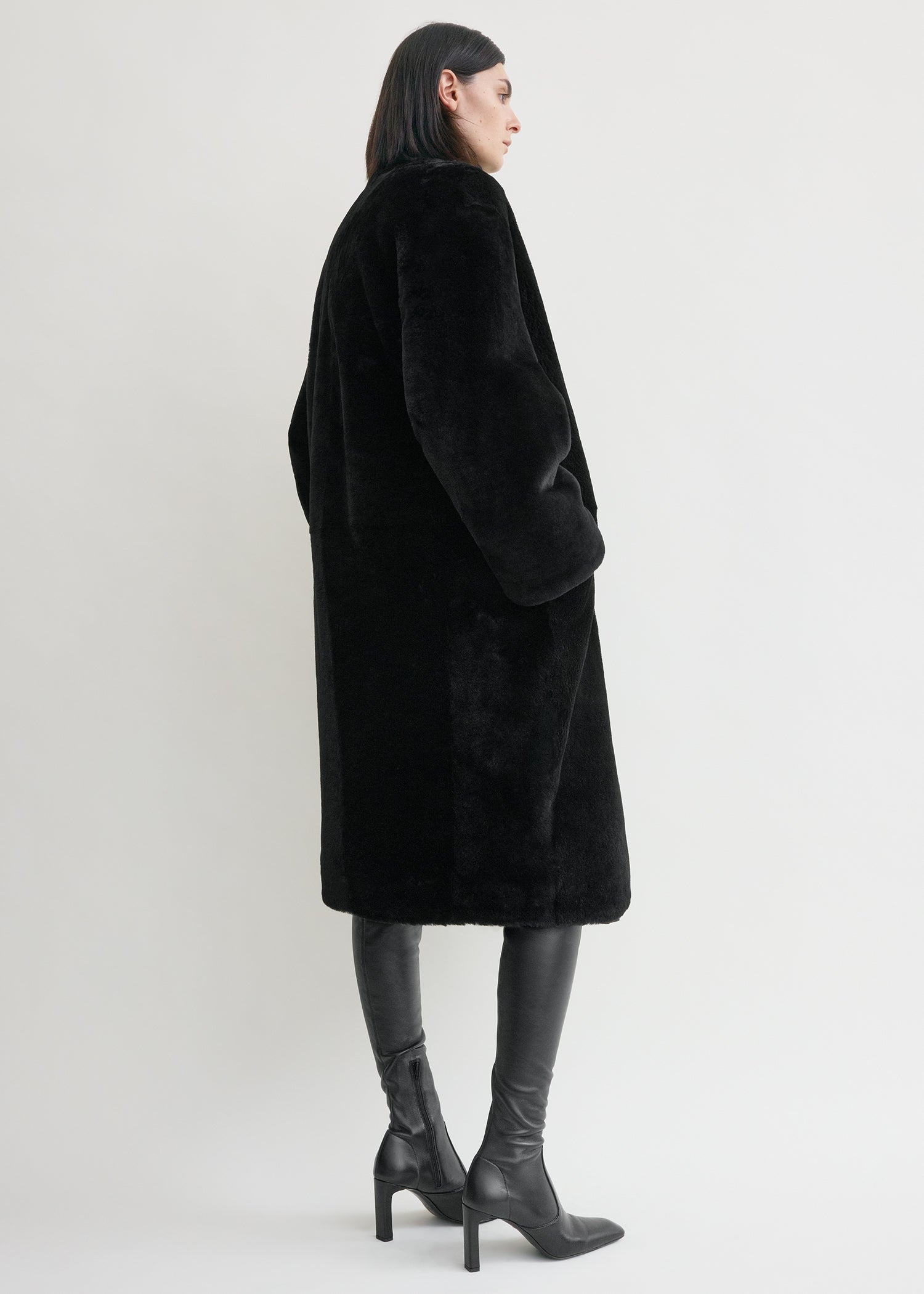 Collarless shearling coat black