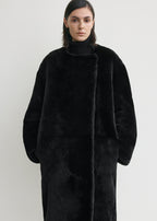 Collarless shearling coat black