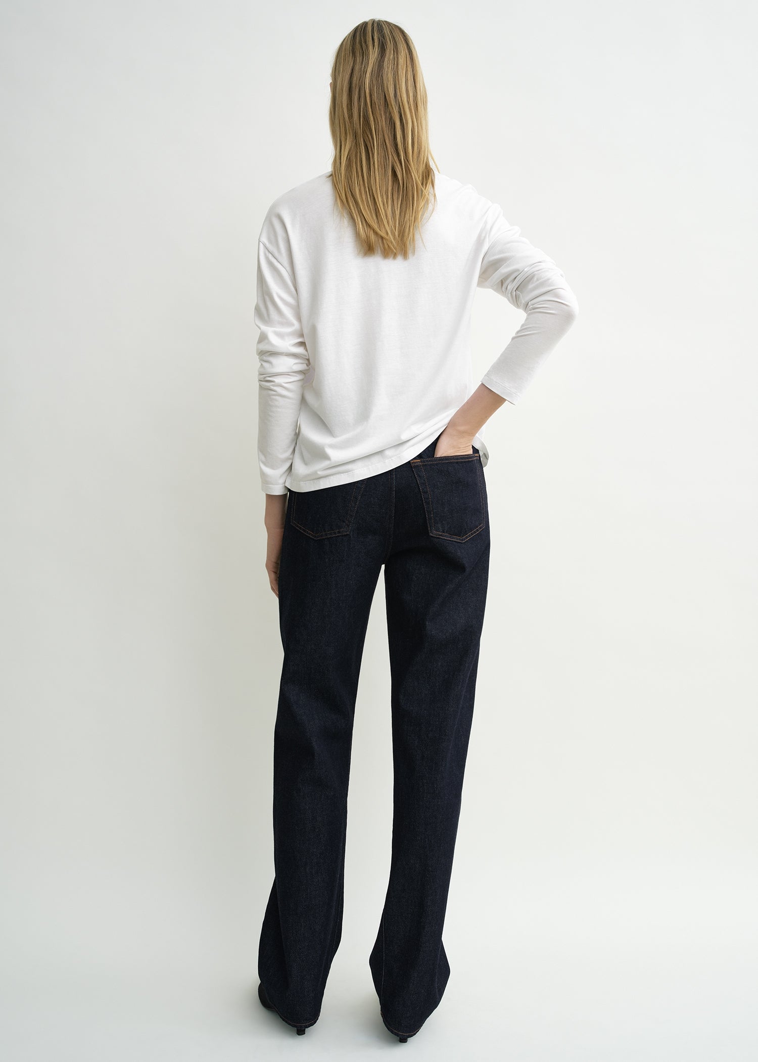 Twisted seam denim full length rinsed blue