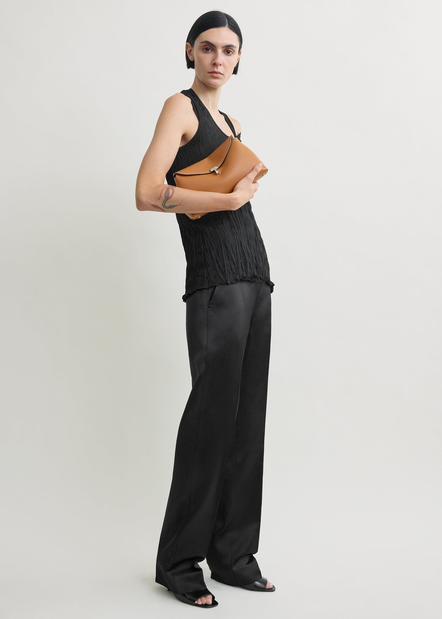 T-lock grained-leather clutch tan