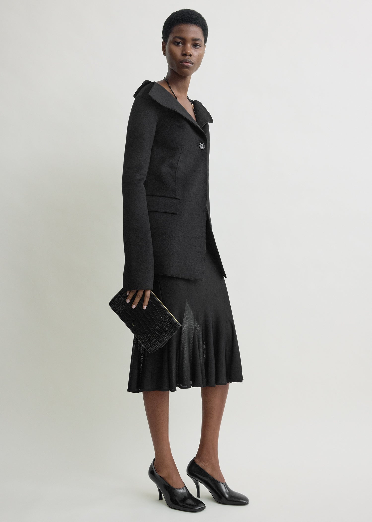 Threefold croco-embossed clutch black