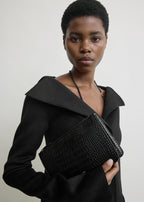 Threefold croco-embossed clutch black