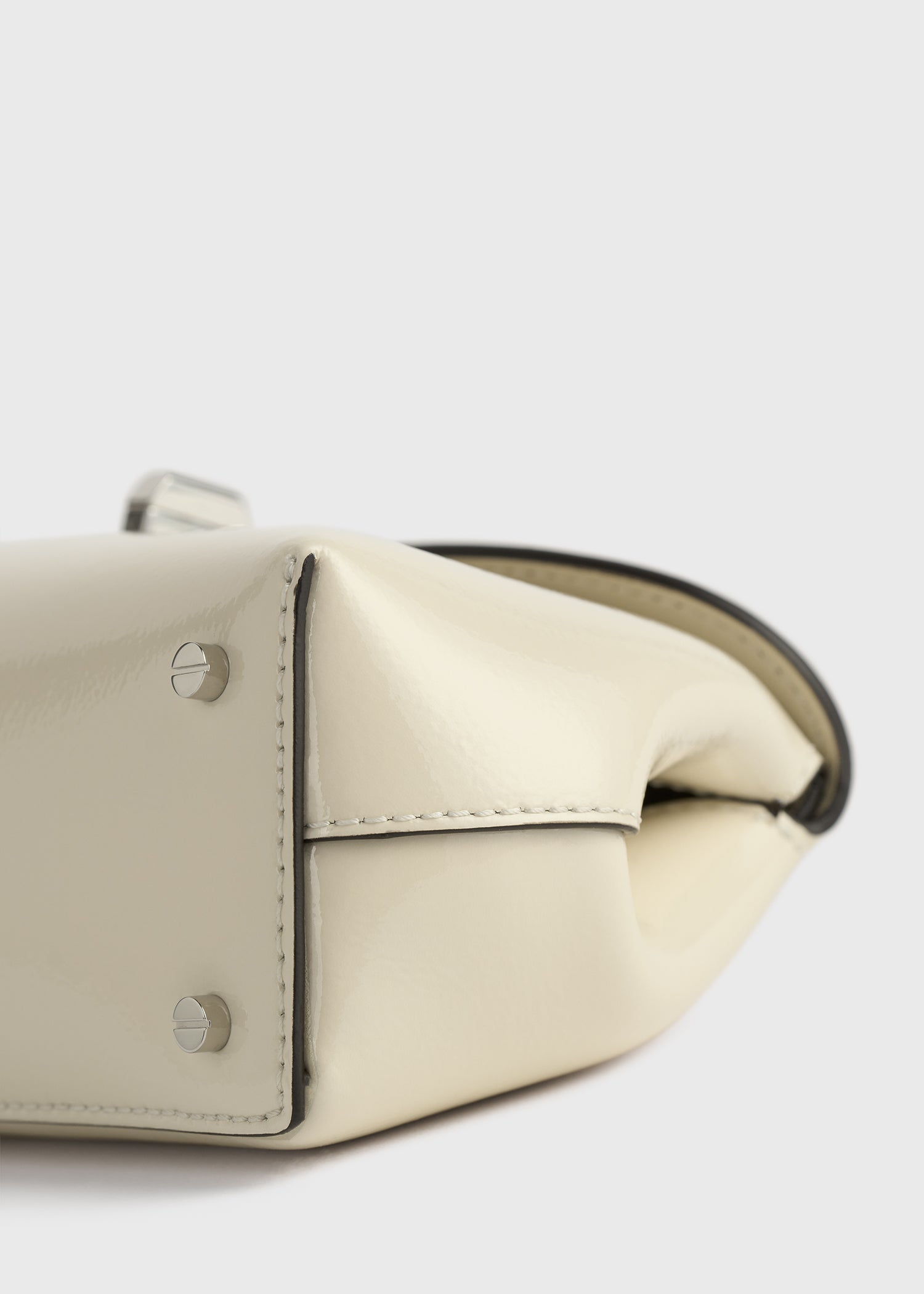 Mini T-lock naplack clutch milk