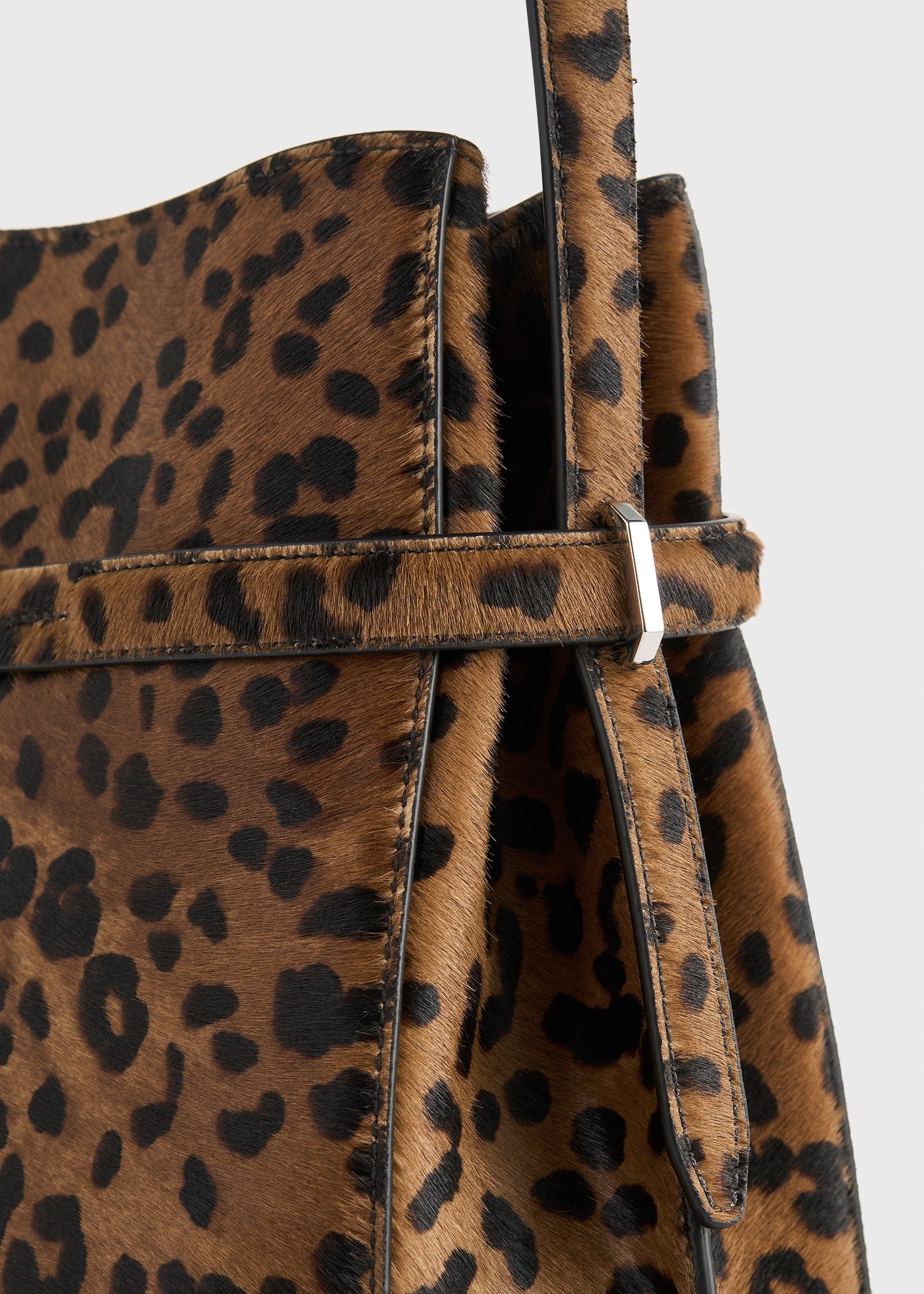Belted pony hair bucket bag leopard