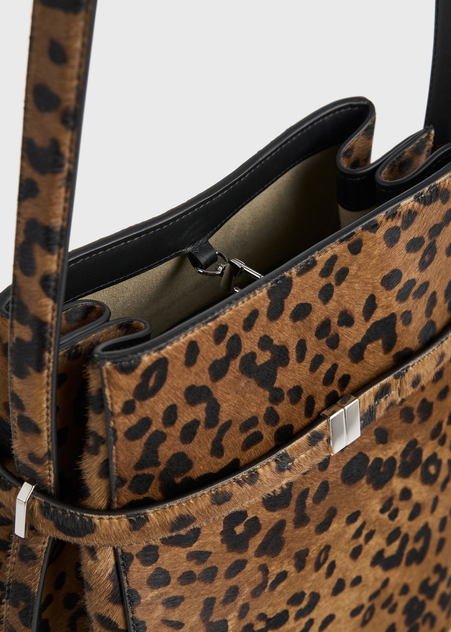Belted pony hair bucket bag leopard