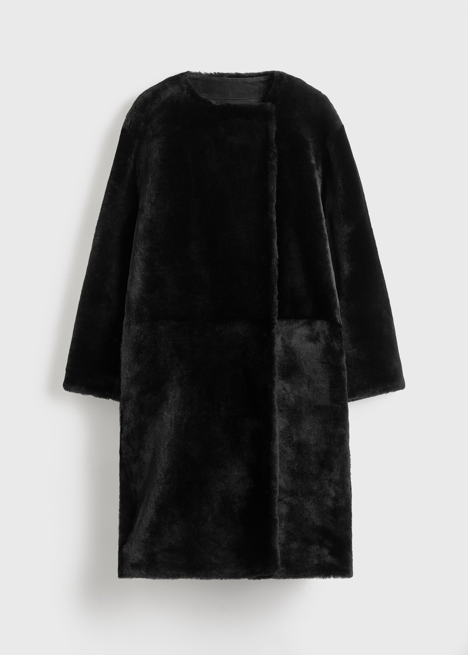 Collarless shearling coat black