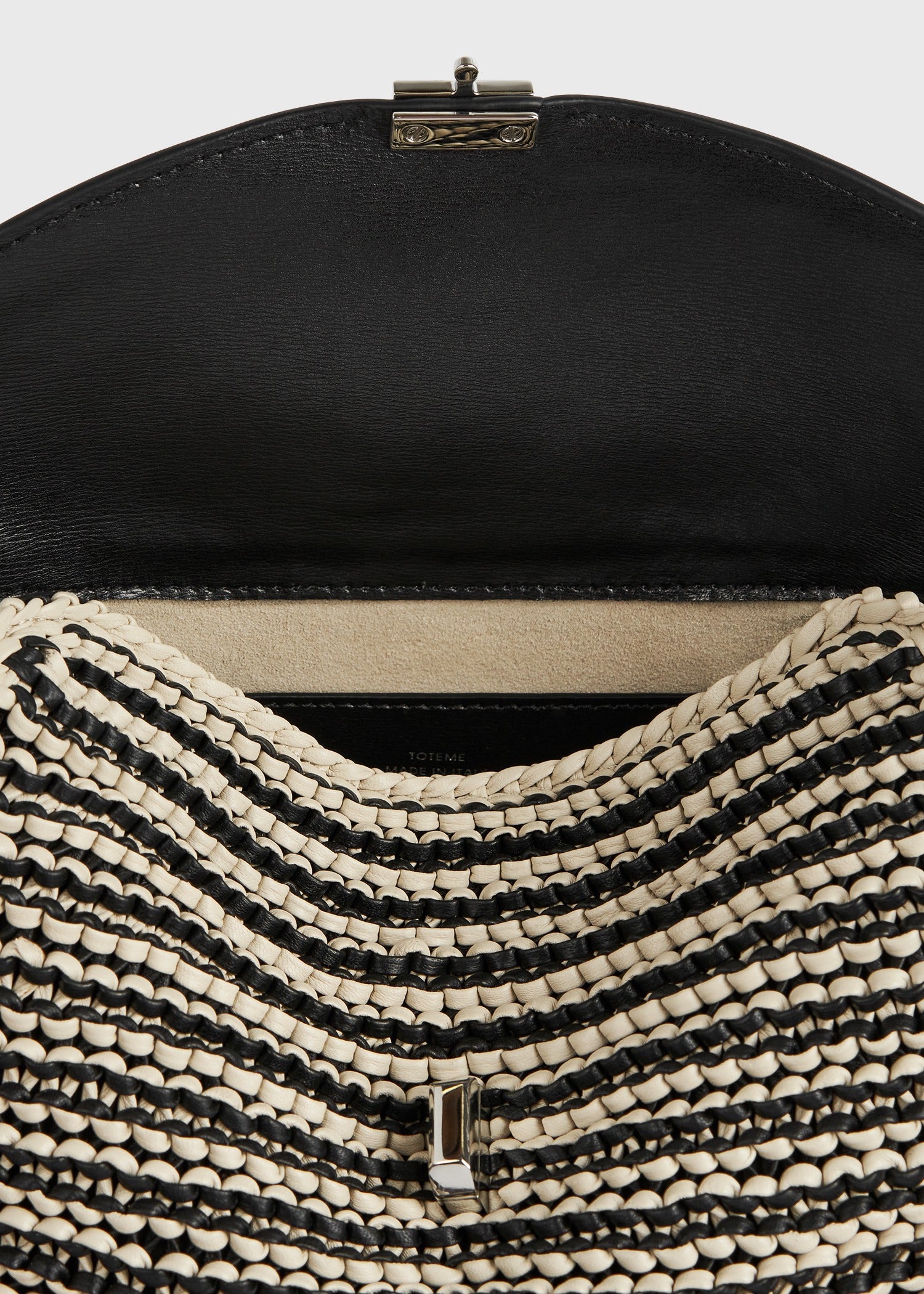 T-lock woven-leather clutch black/sand