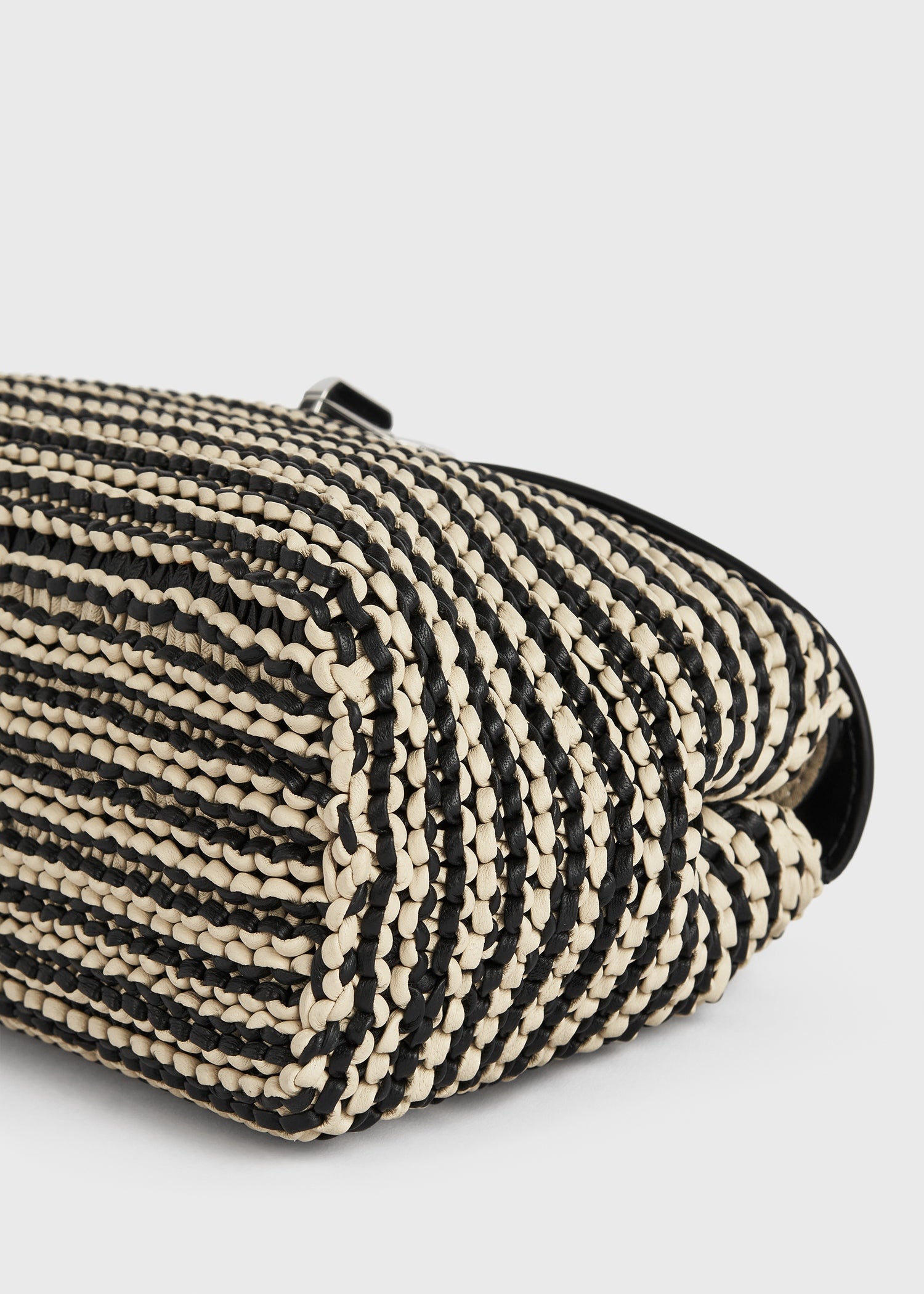 T-lock woven-leather clutch black/sand
