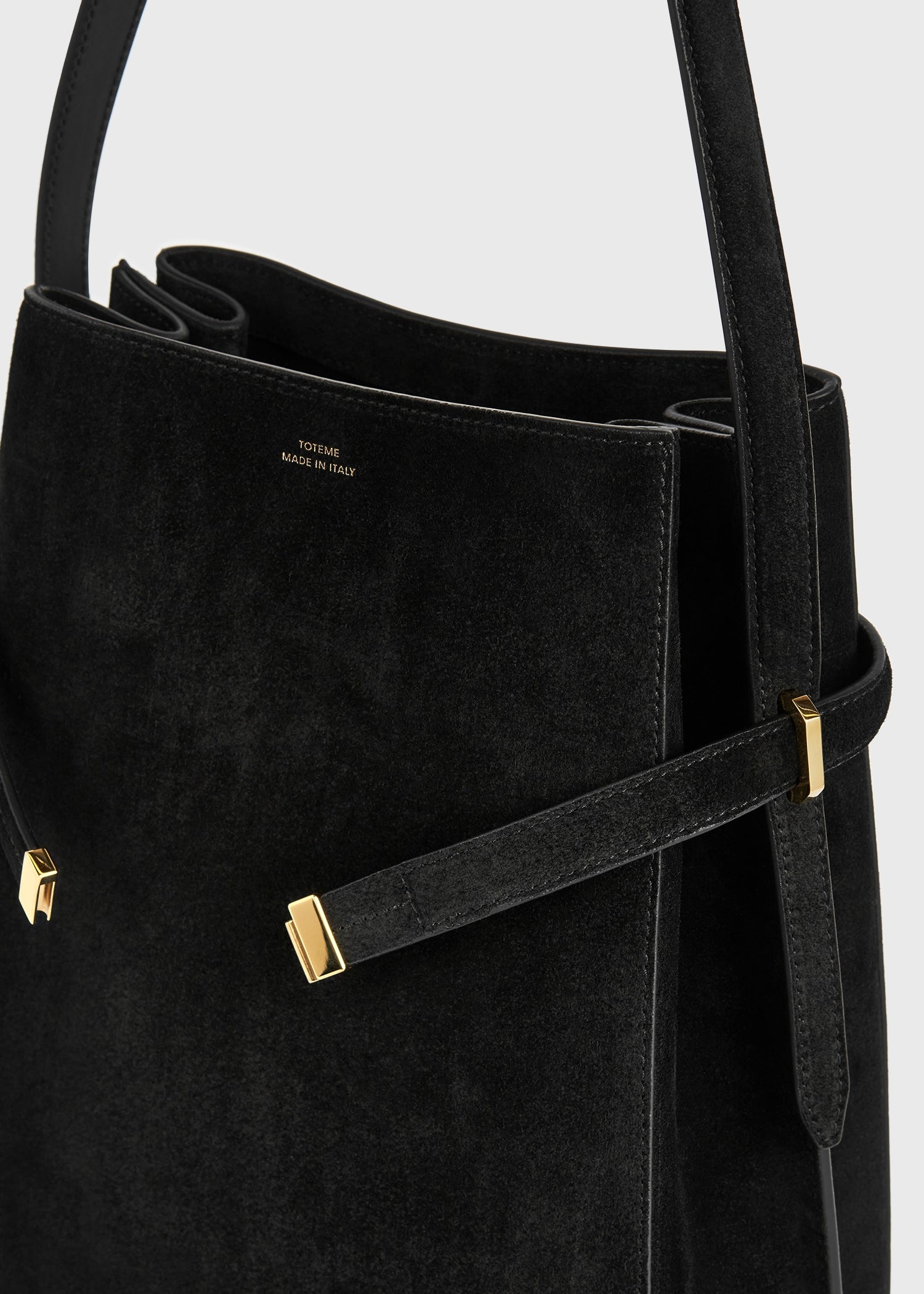 Belted suede bucket bag black