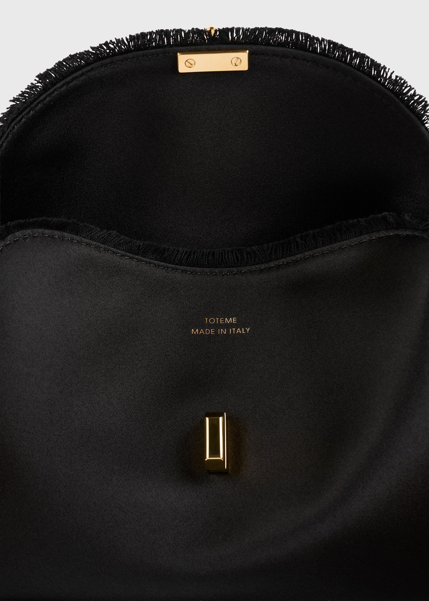 Mini T-lock frayed satin clutch black