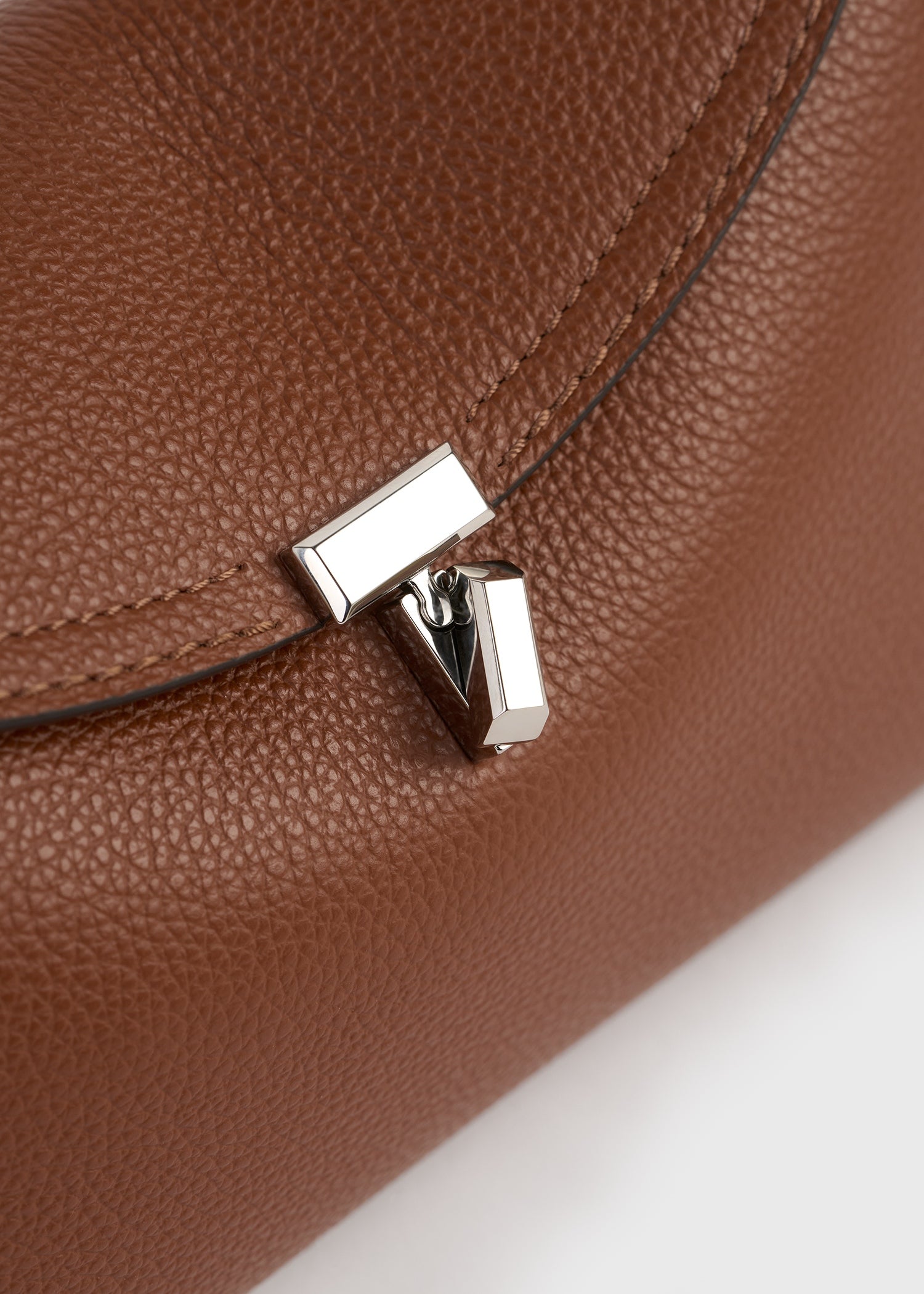 T-lock grained-leather clutch sienna