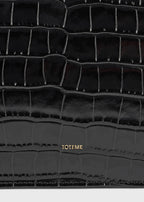 Threefold croco-embossed clutch black