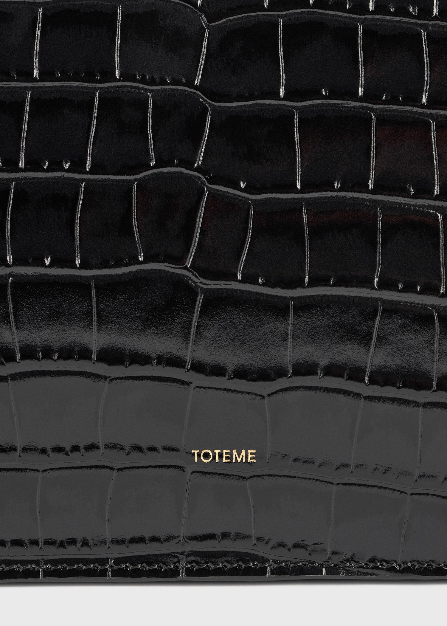 Threefold croco-embossed clutch black