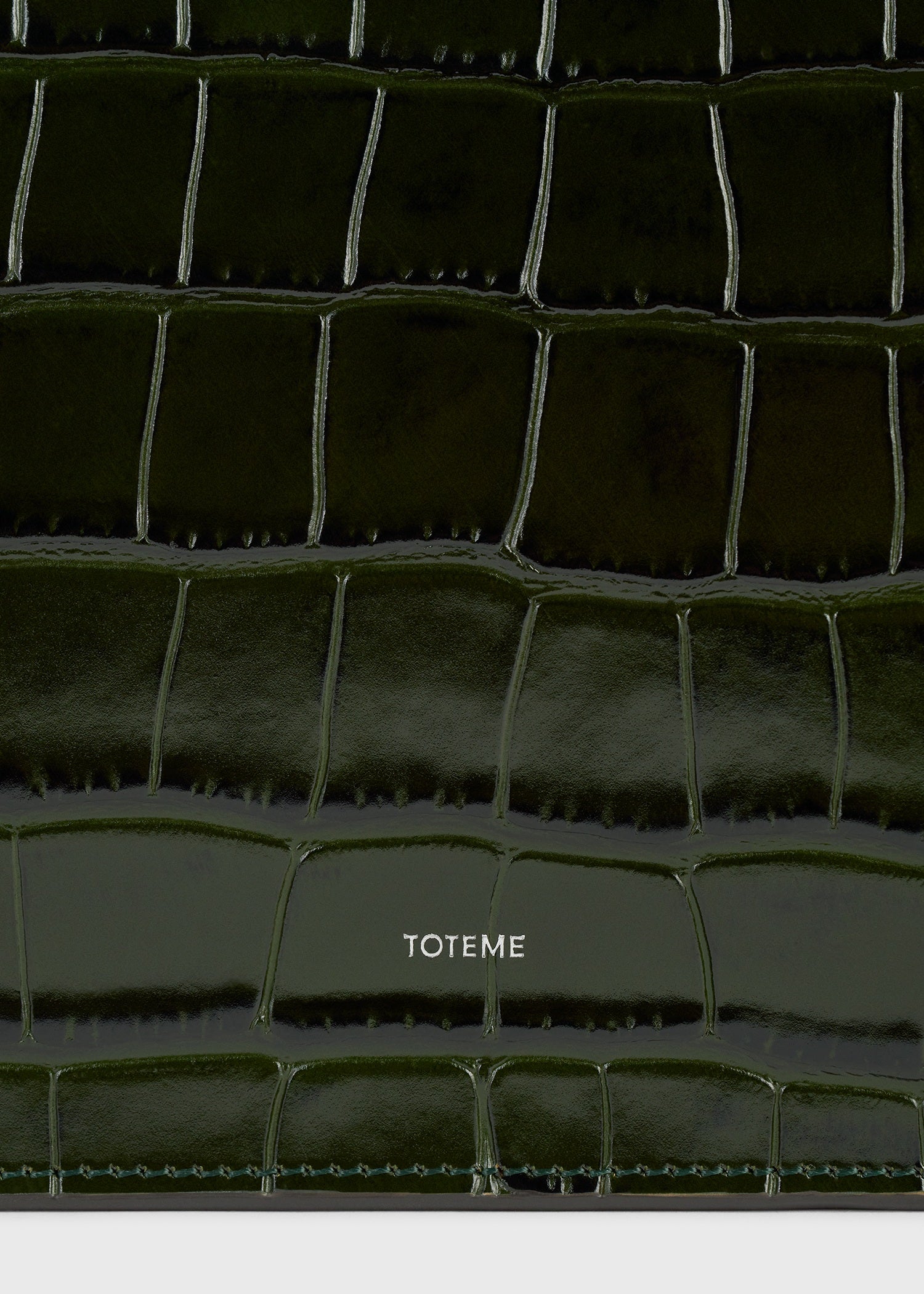 Threefold croco-embossed clutch dark green