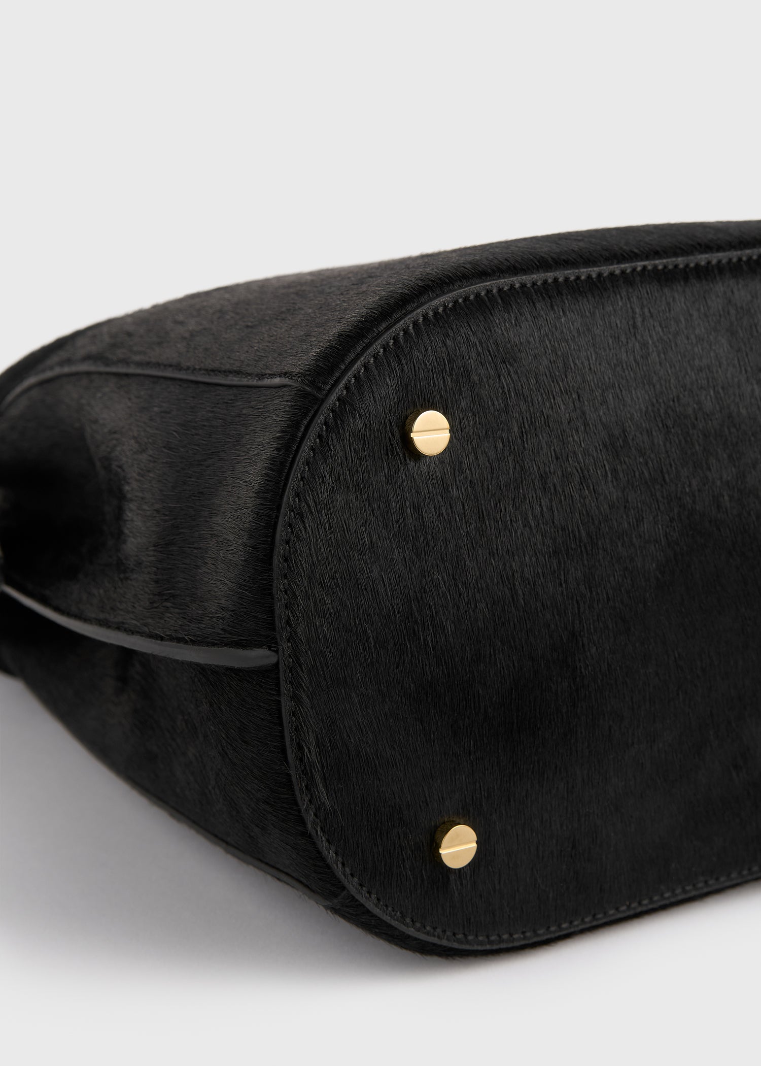 Belted pony hair bucket bag black