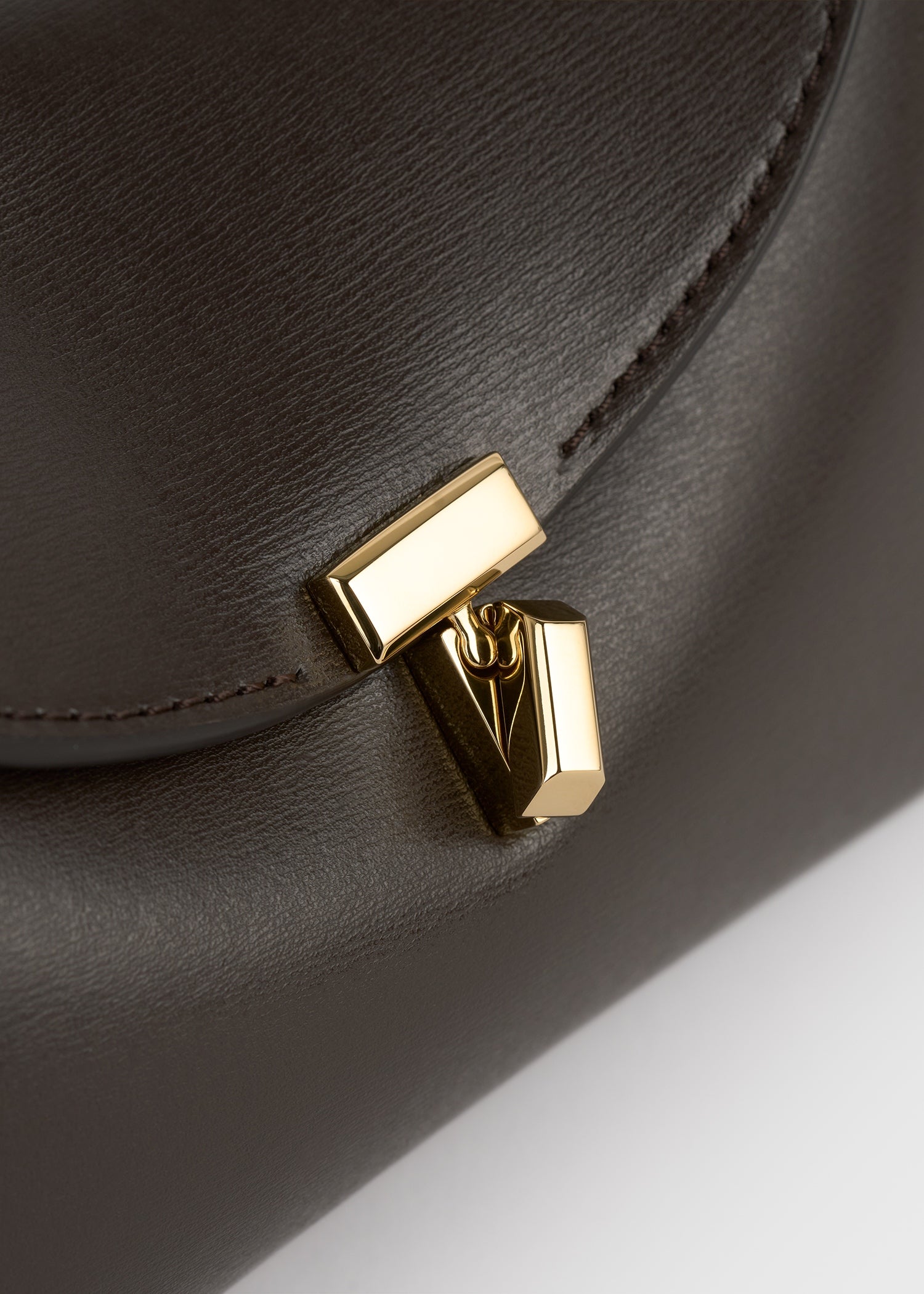 Mini T-lock leather clutch bark