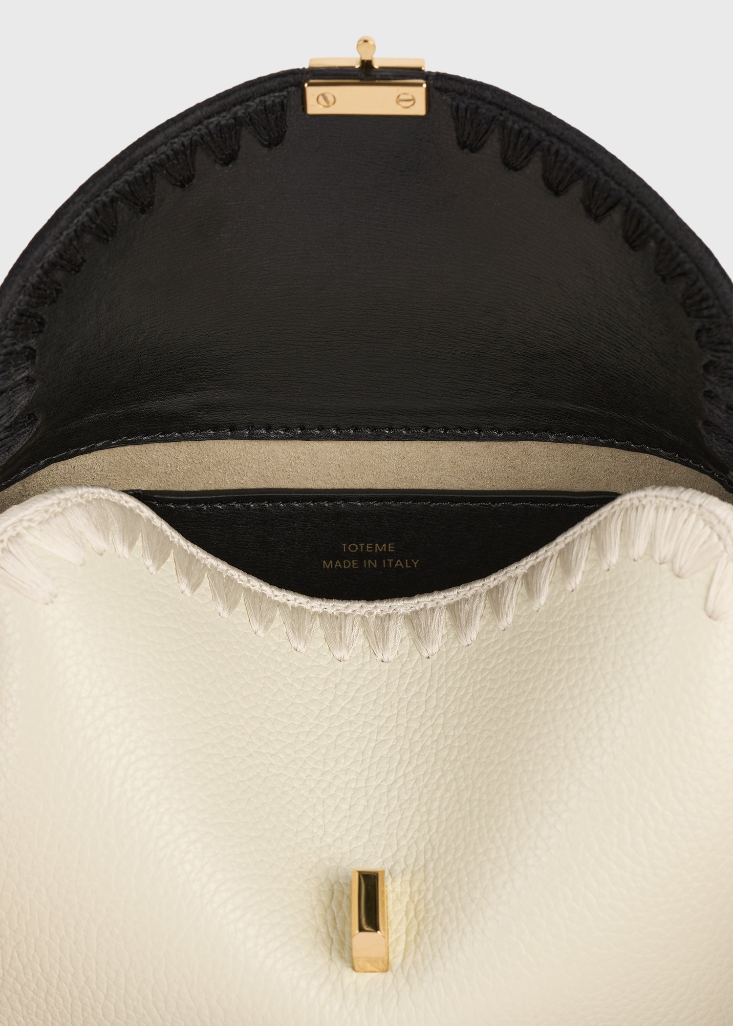 Mini T-lock embroidered leather clutch black/milk