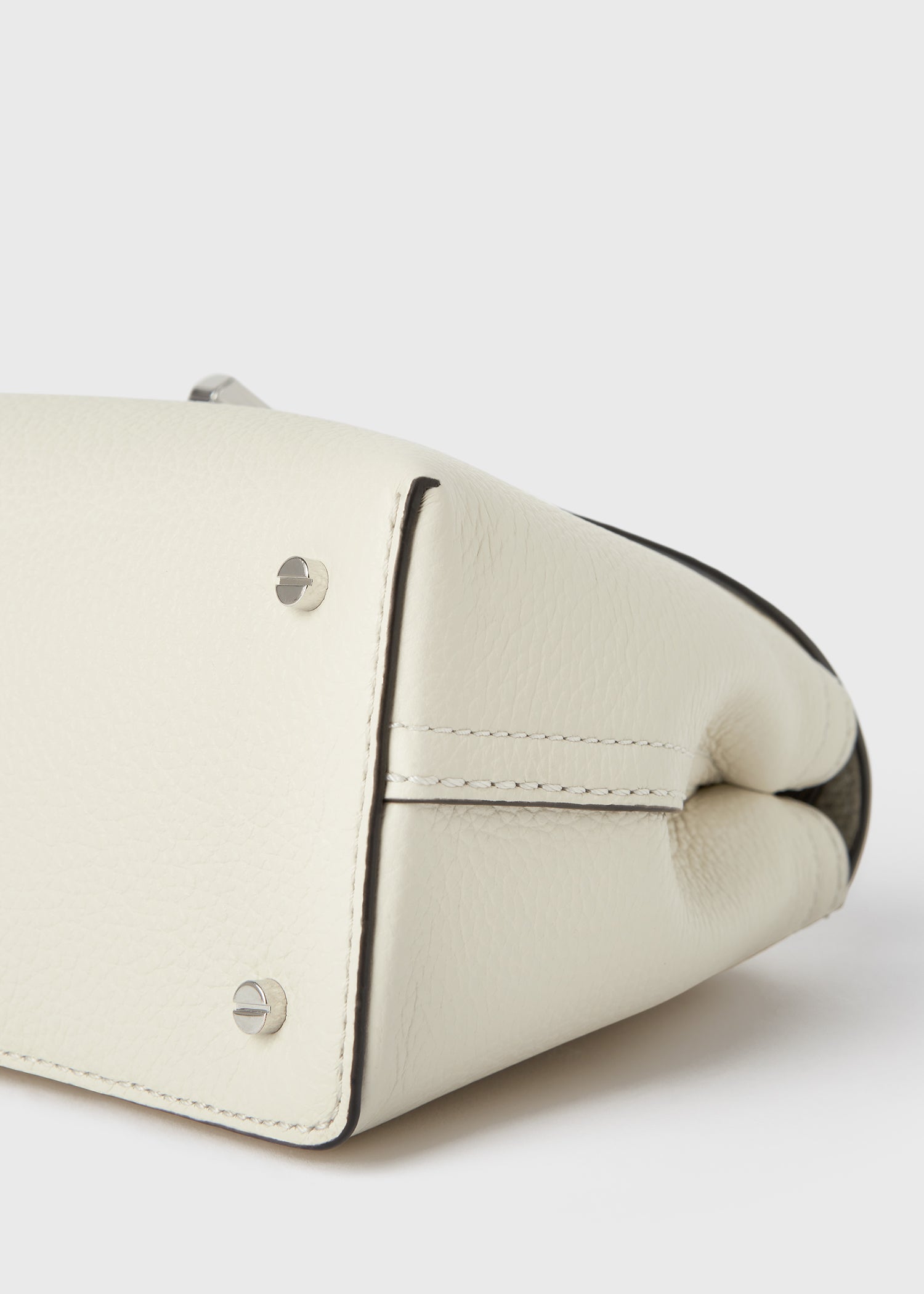 T-lock grained-leather clutch milk