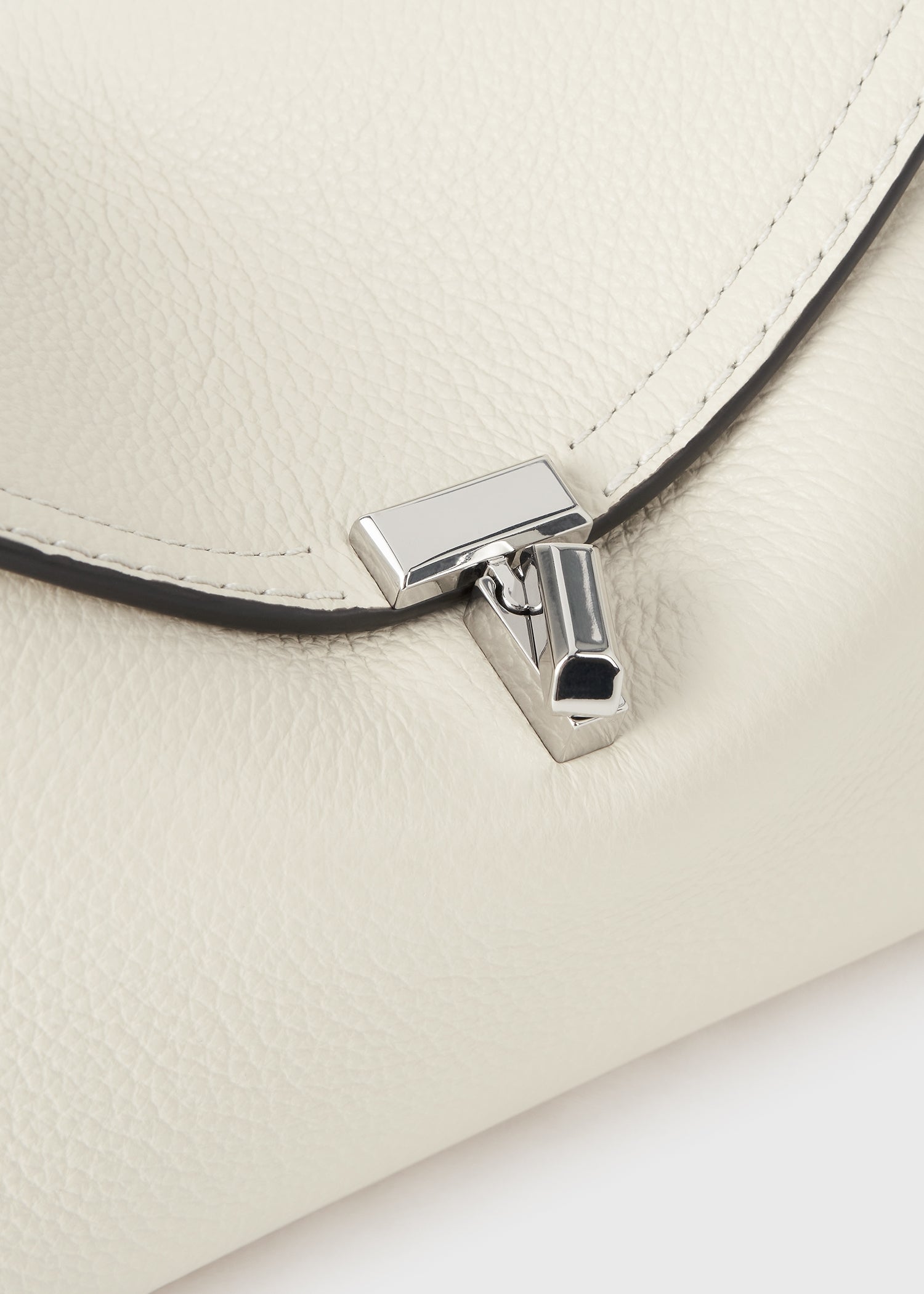 T-lock grained-leather clutch milk