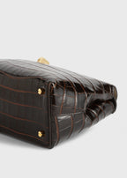 T-lock croco-embossed clutch dark brown
