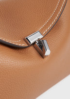 T-lock grained-leather clutch tan