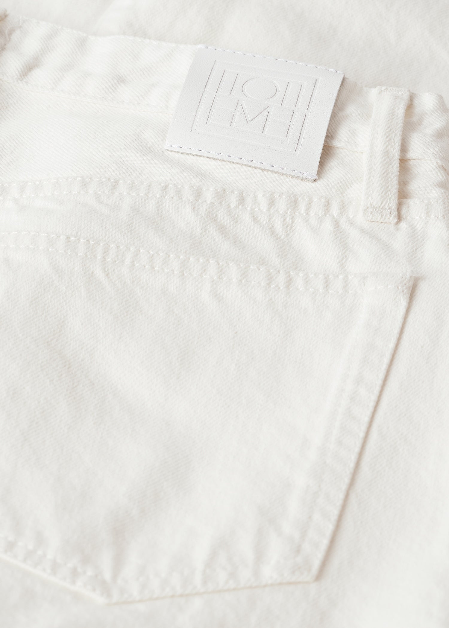 Twisted seam denim full length off-white – TOTEME