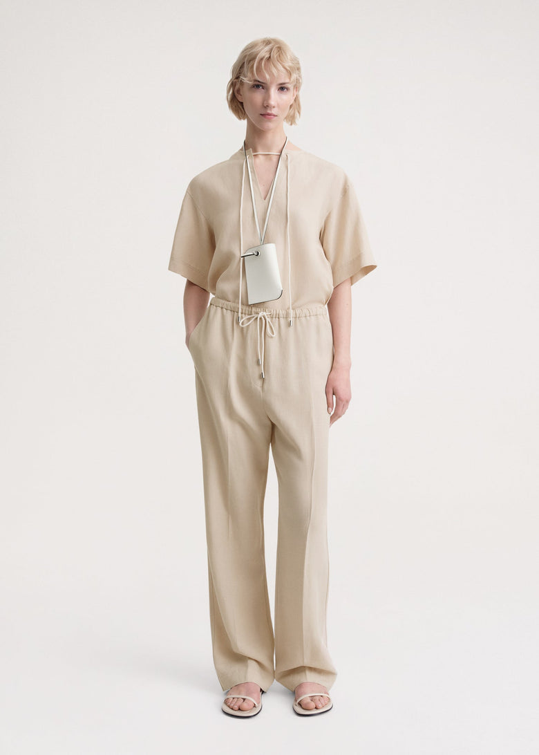 Press-creased drawstring trousers overcast beige