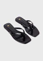 Croco-embossed flip flops black